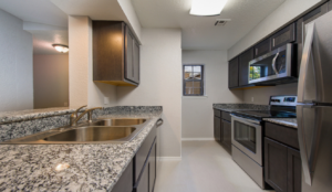 inside the kitchen of a condo